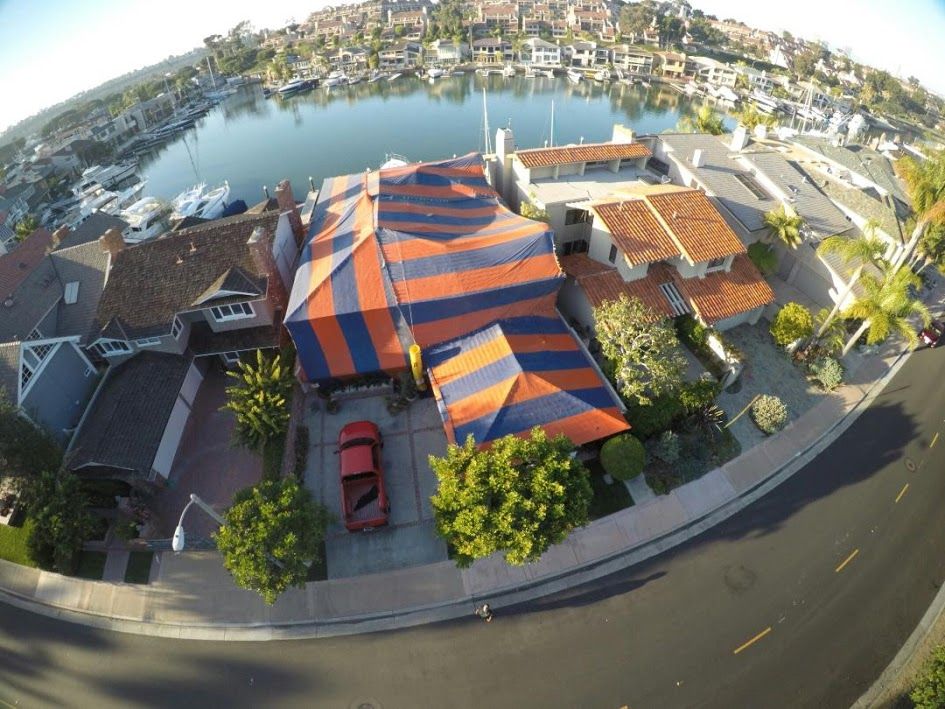 Drone view of a Tiger Termite Control fumigation tent covering a Southern California home